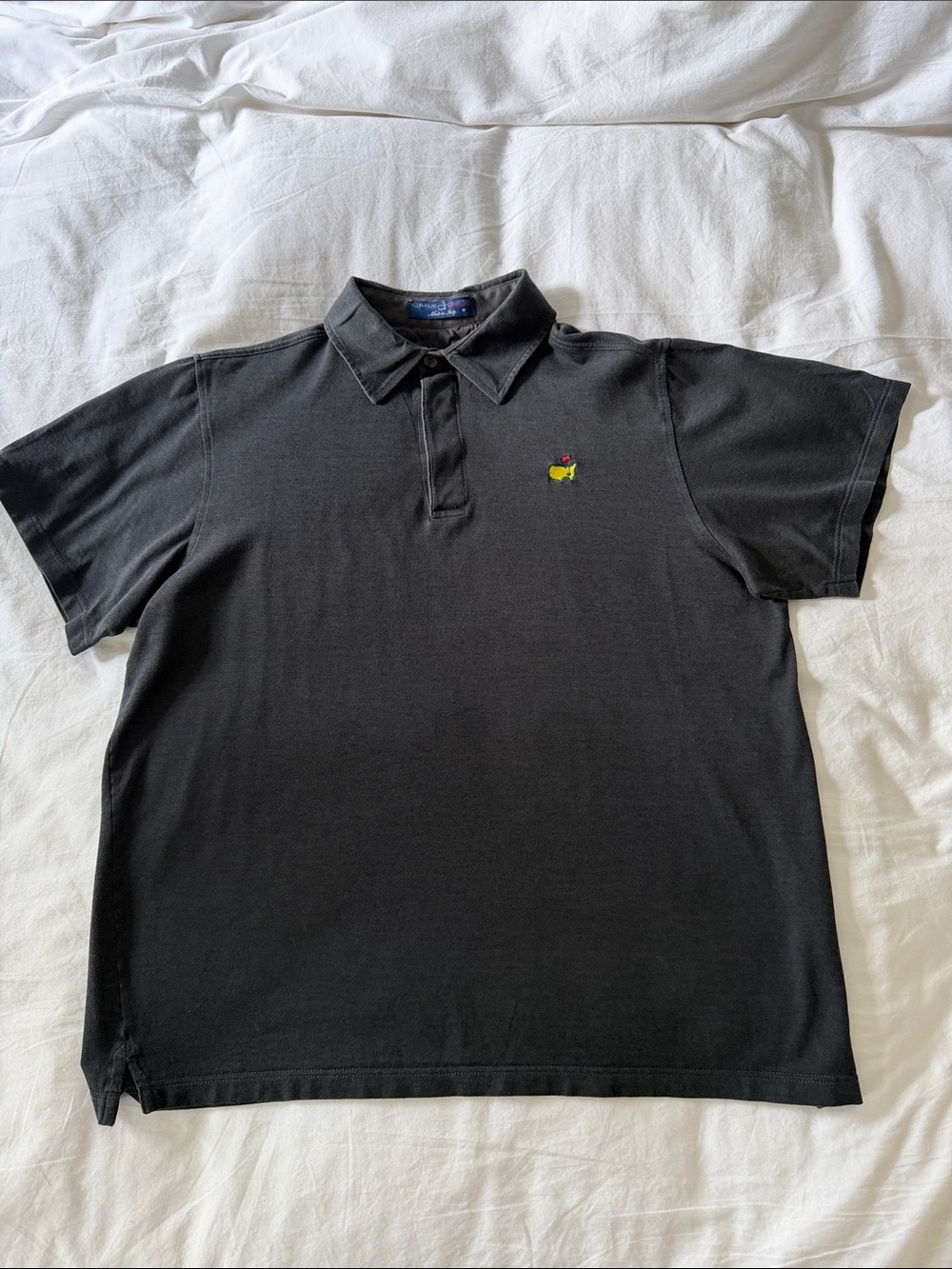 Deep Charcoal Gray Men's Polo Shirt with Small Multicolor Chest Motif